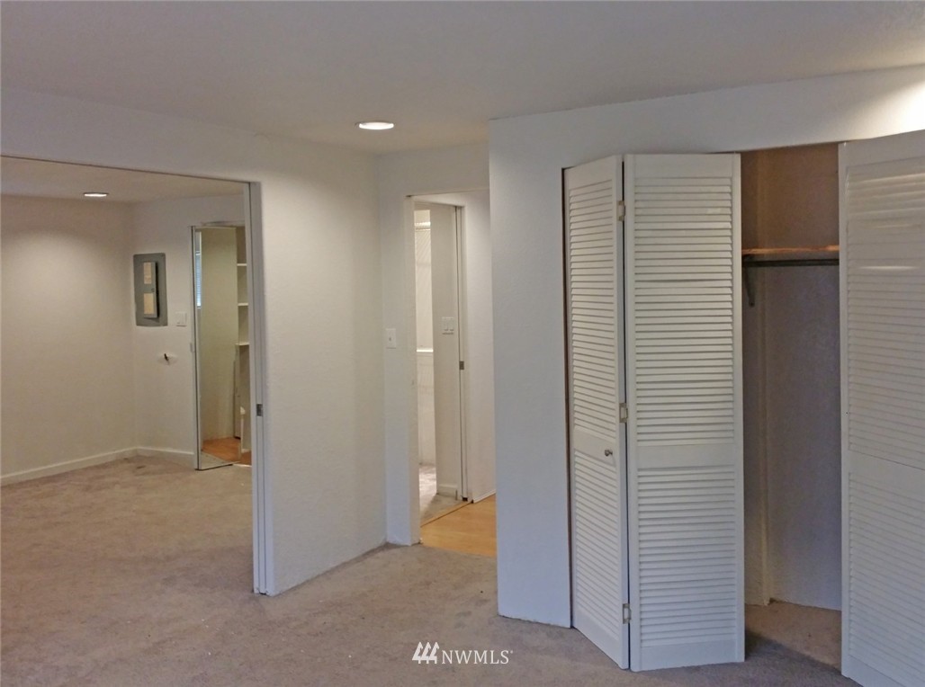 19007 126th Avenue Northeast Bothell, WA 98011 - Photo 8 of 15 a view of hallway with closet and a bathroom