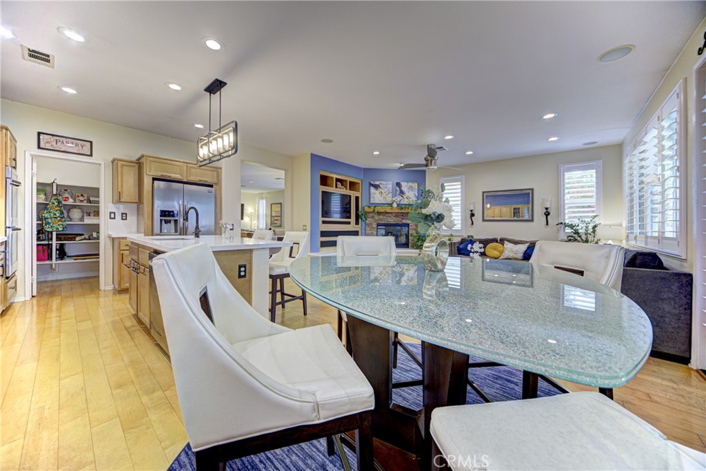 32185 Bandelier Road Winchester, CA 92596 - Photo 11 of 47 a view of a dining room with furniture