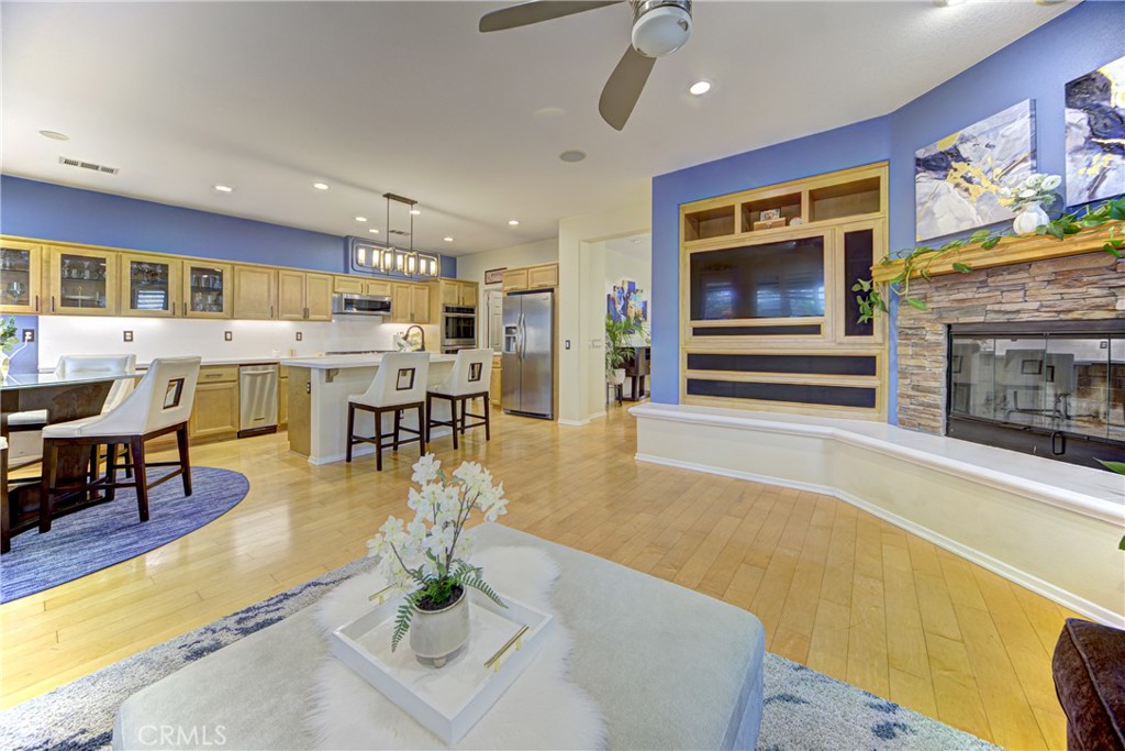 32185 Bandelier Road Winchester, CA 92596 - Photo 14 of 47 a living room with furniture a dining table and kitchen view