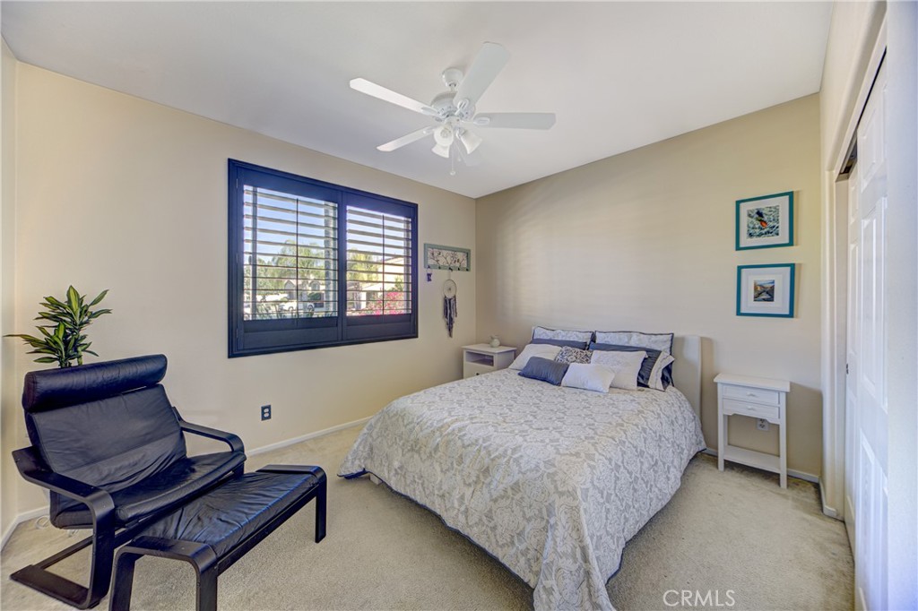 32185 Bandelier Road Winchester, CA 92596 - Photo 21 of 47 a bedroom with a bed and window