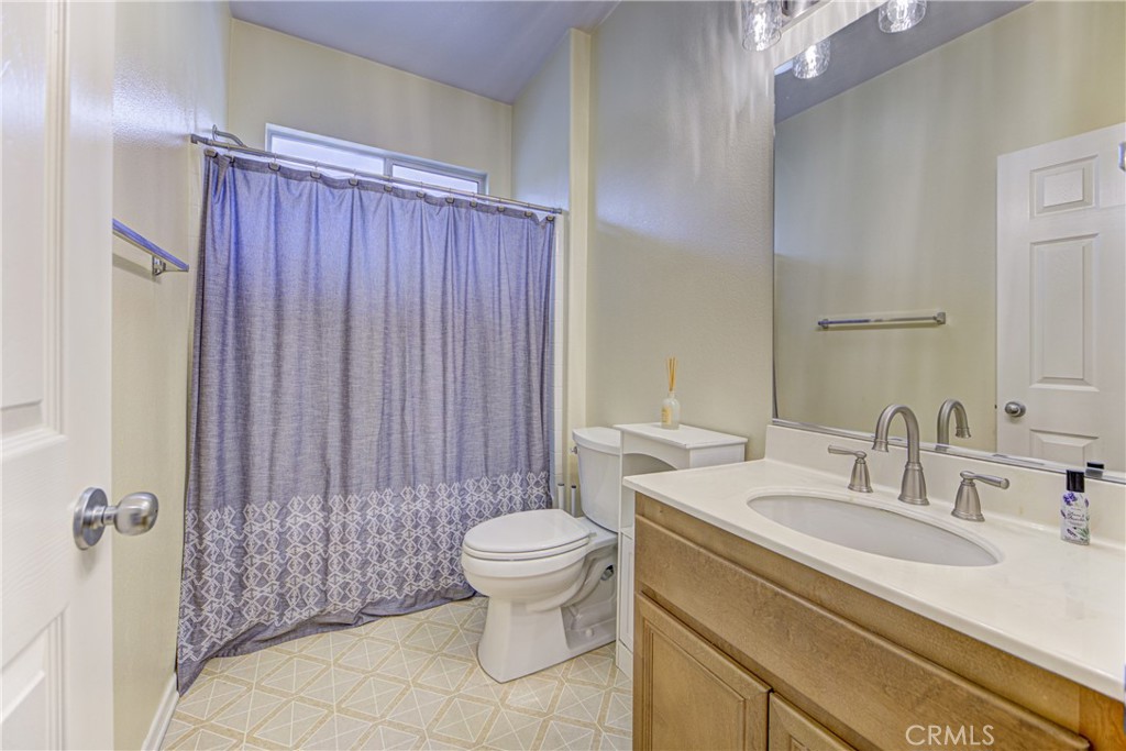 32185 Bandelier Road Winchester, CA 92596 - Photo 22 of 47 a bathroom with a sink toilet and shower