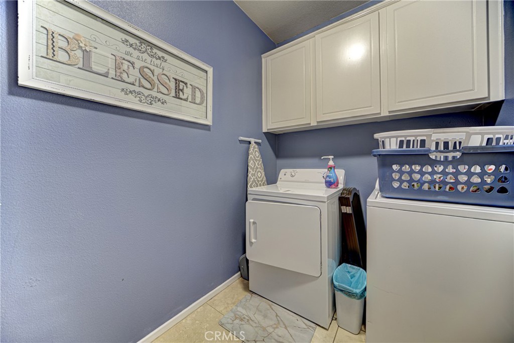 32185 Bandelier Road Winchester, CA 92596 - Photo 26 of 47 a utility room with dryer and washer