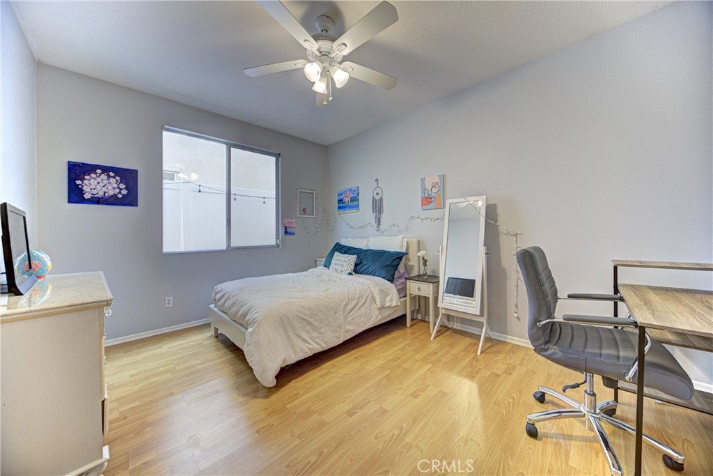 32185 Bandelier Road Winchester, CA 92596 - Photo 31 of 47 a bedroom with a bed furniture and window