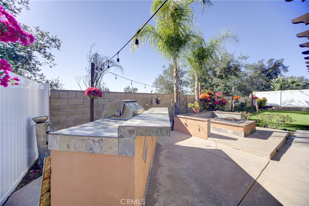 32185 Bandelier Road Winchester, CA 92596 - Photo 33 of 47 a view of a backyard with sitting area
