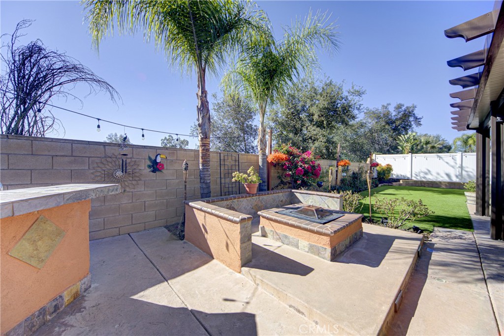 32185 Bandelier Road Winchester, CA 92596 - Photo 35 of 47 a view of a backyard with sitting area