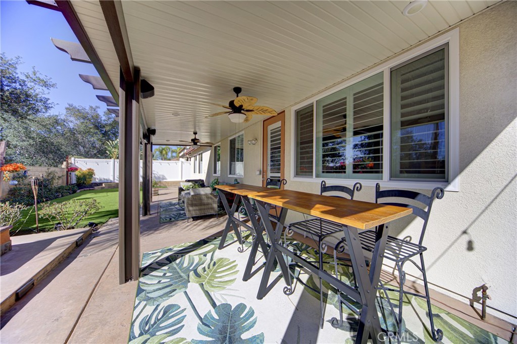 32185 Bandelier Road Winchester, CA 92596 - Photo 36 of 47 a view of balcony with a patio and outdoor seating