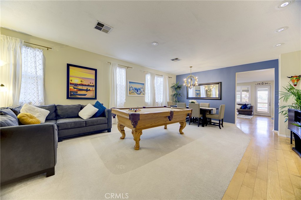 32185 Bandelier Road Winchester, CA 92596 - Photo 4 of 47 a living room with furniture and a wooden floor