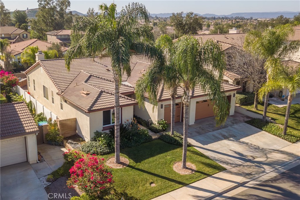 32185 Bandelier Road Winchester, CA 92596 - Photo 43 of 47 a front view of a house with yard