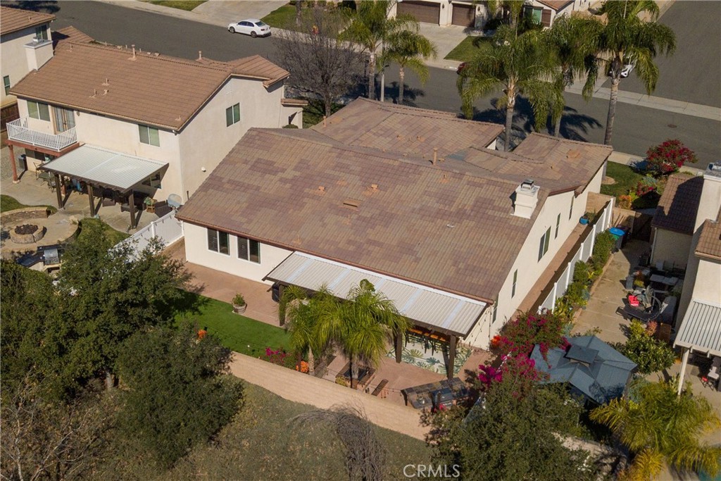 32185 Bandelier Road Winchester, CA 92596 - Photo 47 of 47 an aerial view of a house with a yard and potted plants