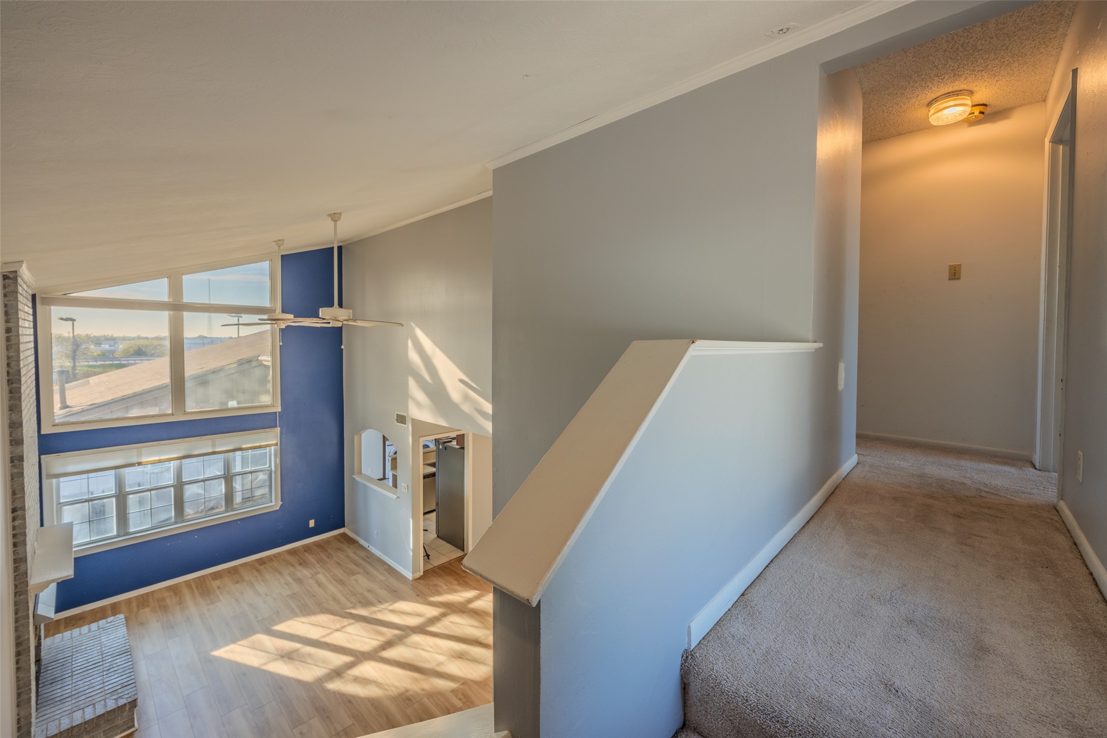 2002 South Lubbock Street Brenham, TX 77833 - Photo 21 of 26 a view of entryway and hall with wooden floor