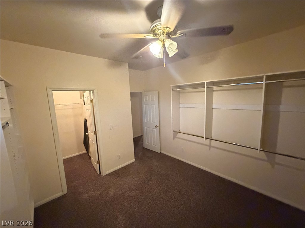 7629 Rory Court Las Vegas, NV 89129 - Photo 19 of 25 A well-organized closet area with integrated storage solutions awaits your wardrobe.