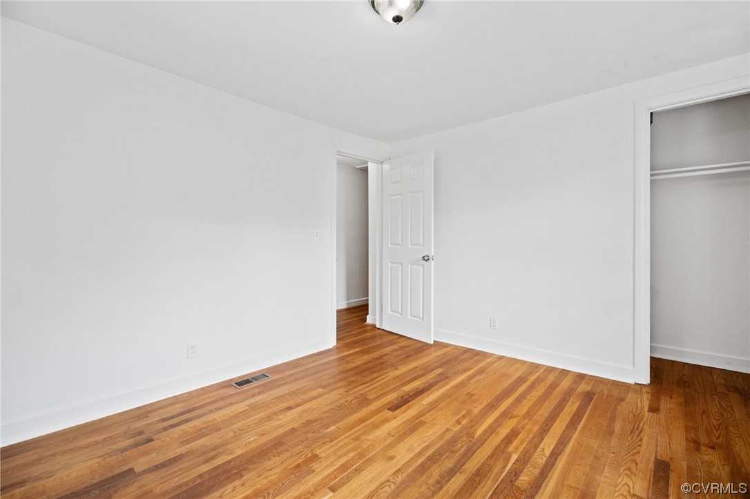 11252 Cauthorne Road Glen Allen, VA 23059 - Photo 23 of 45 a view of an empty room with wooden floor