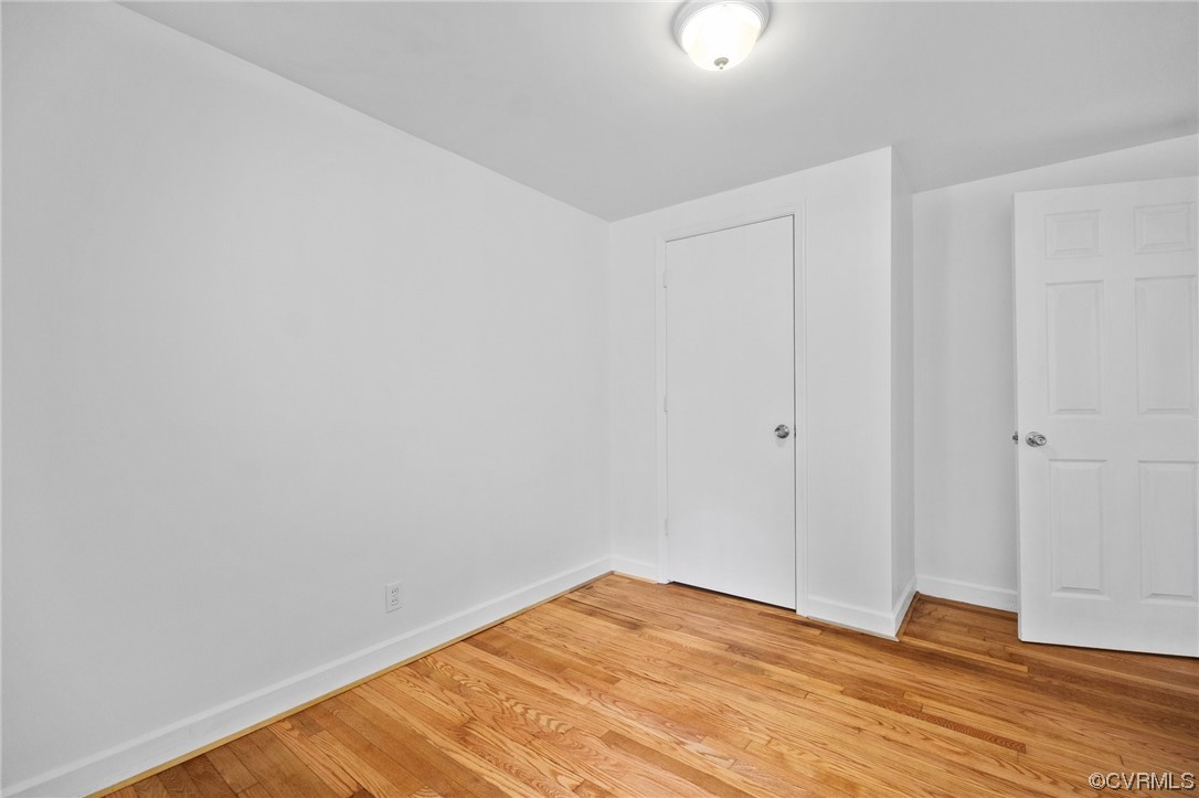 11252 Cauthorne Road Glen Allen, VA 23059 - Photo 25 of 45 a view of empty room with wooden floor