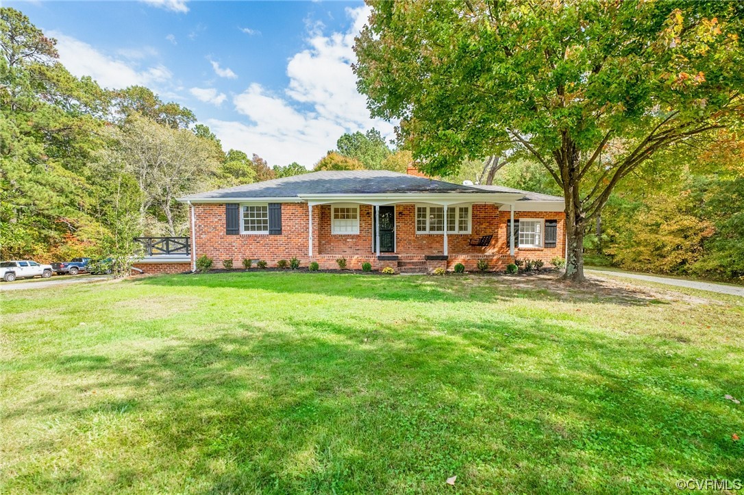11252 Cauthorne Road Glen Allen, VA 23059 - Photo 3 of 45 a view of a house with a backyard