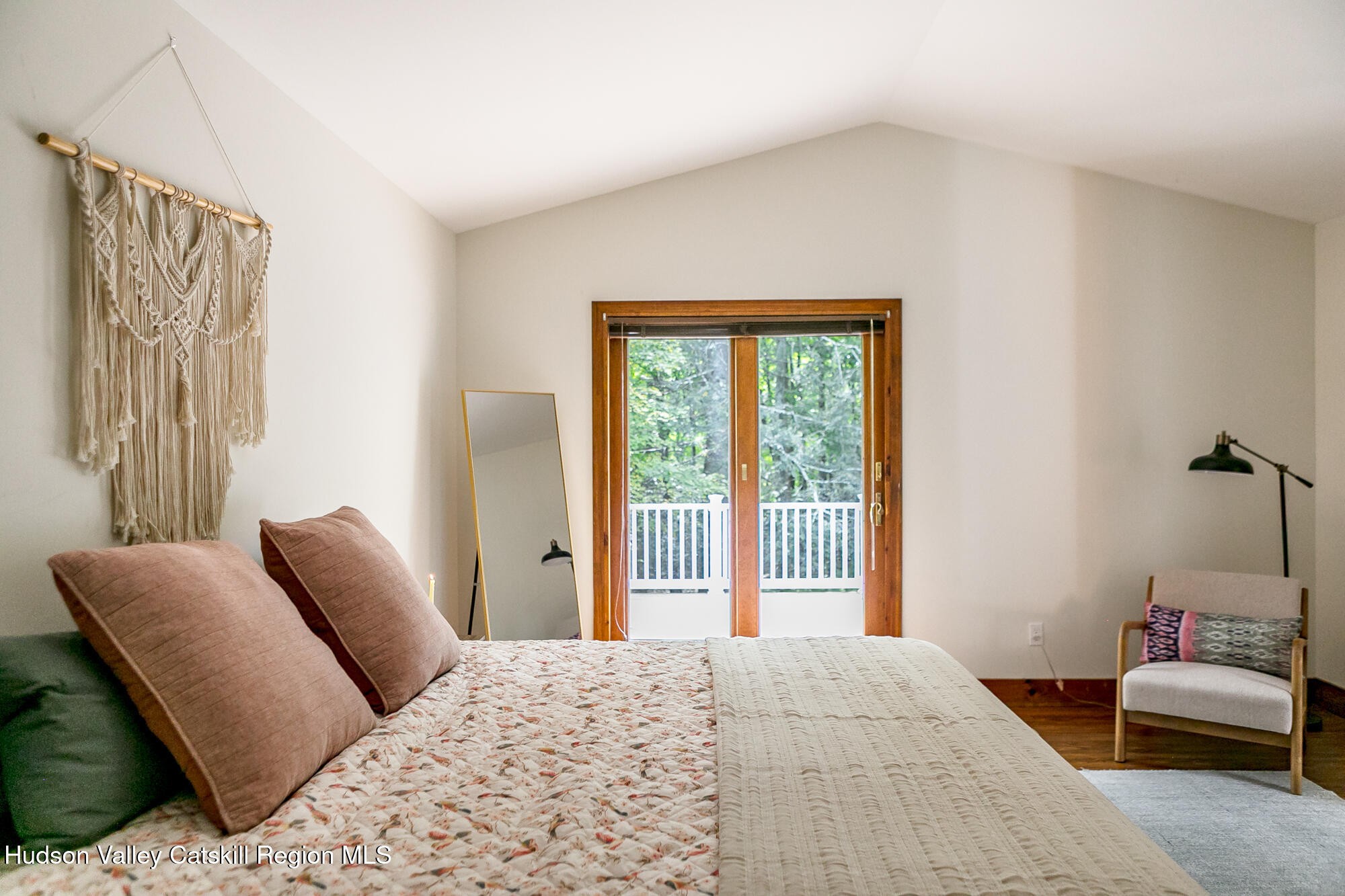 2 Romney Way Cottekill, NY 12419 - Photo 11 of 33 a bedroom with a bed and a couch