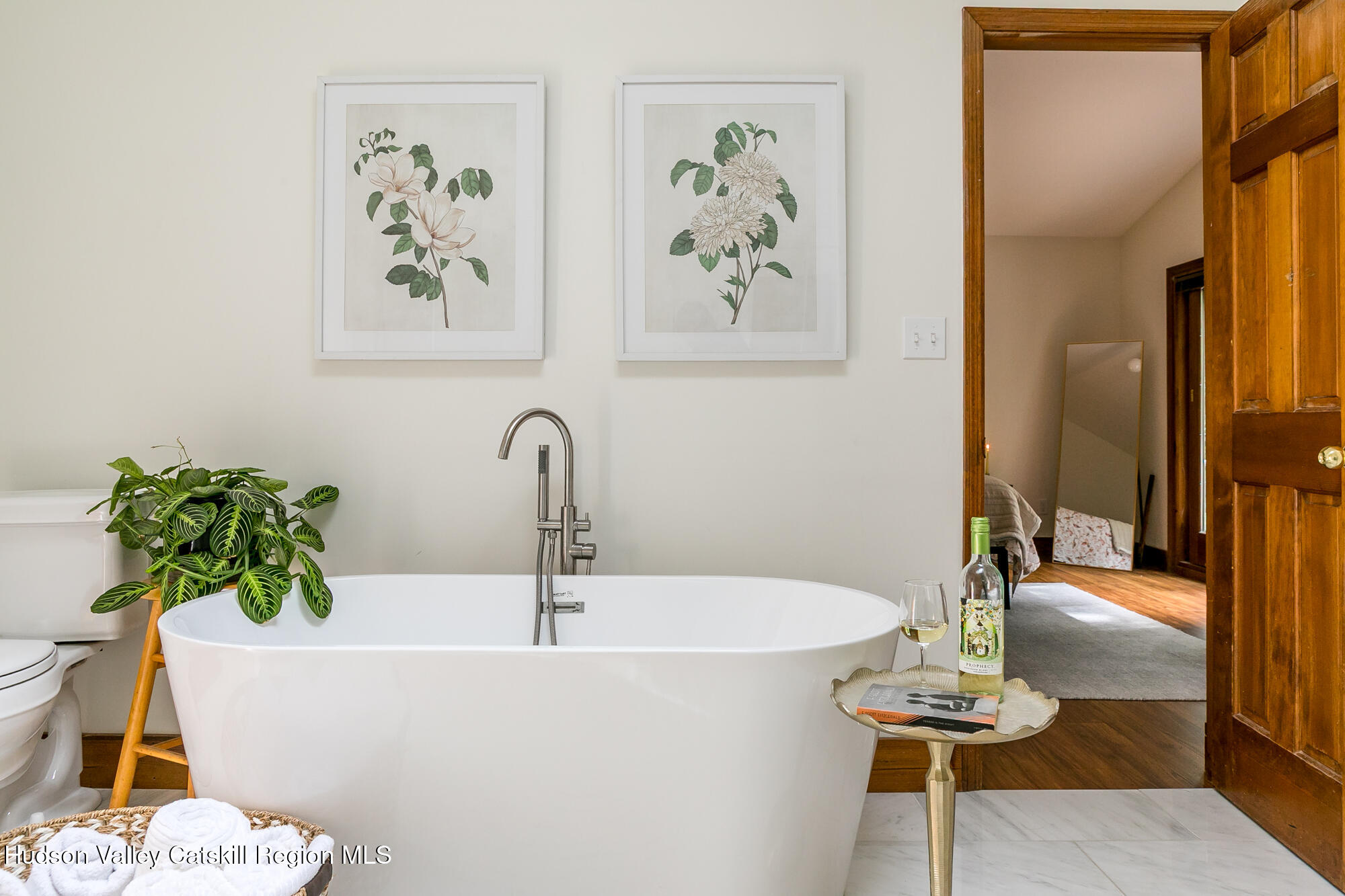 2 Romney Way Cottekill, NY 12419 - Photo 12 of 33 a white bath tub sitting next to a bathroom sink