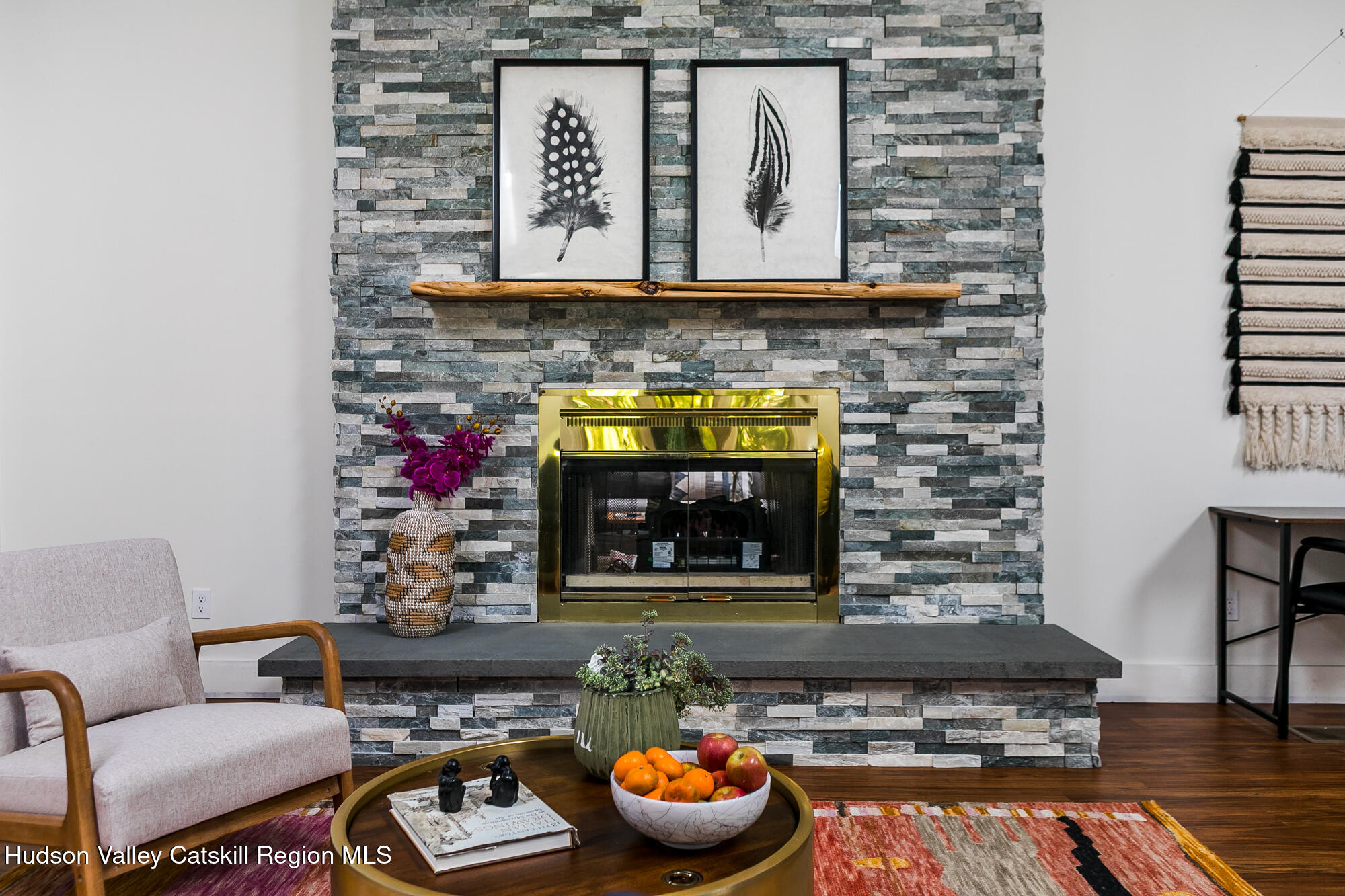 2 Romney Way Cottekill, NY 12419 - Photo 20 of 33 a living room with furniture and a fireplace