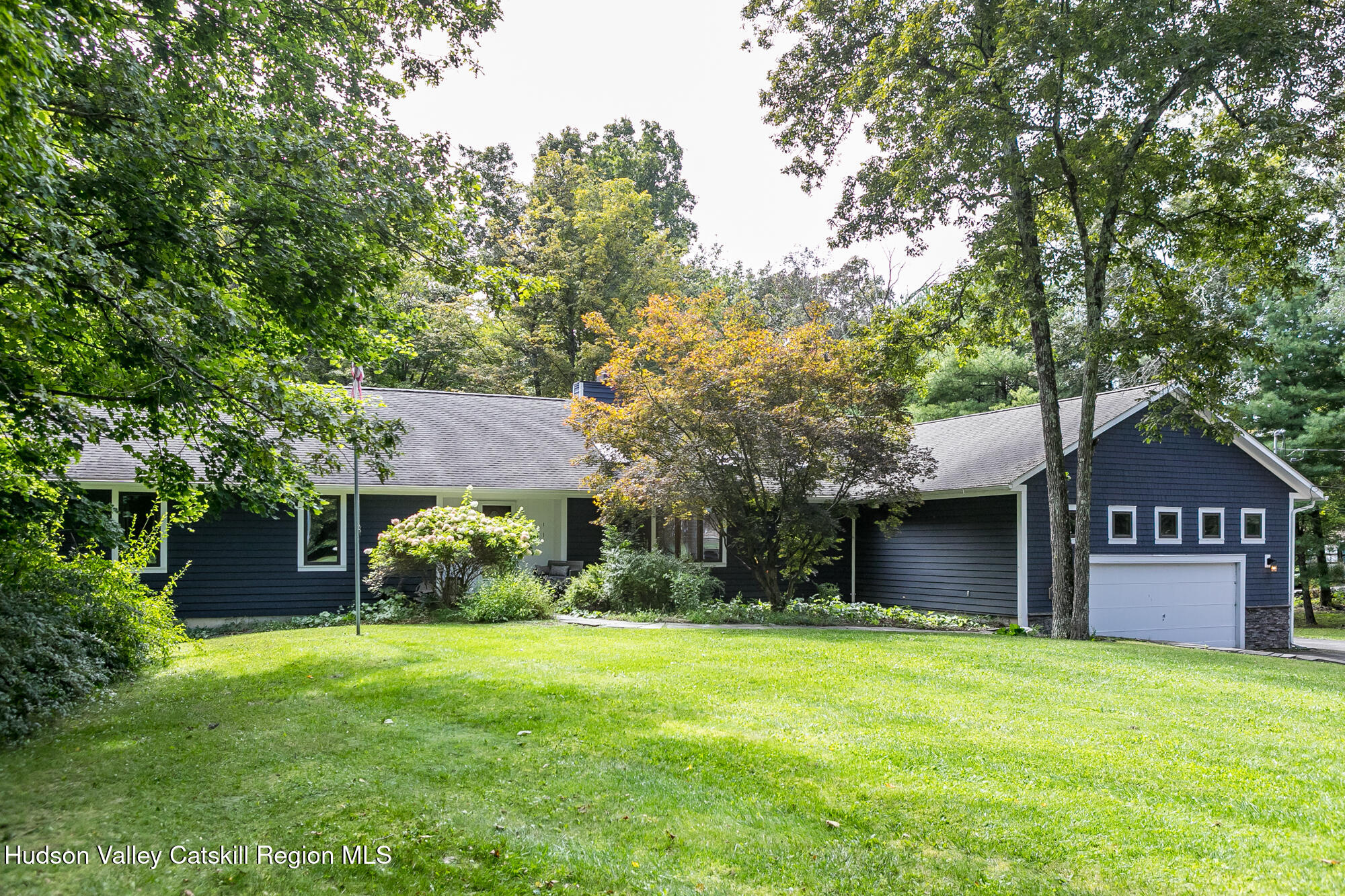 2 Romney Way Cottekill, NY 12419 - Photo 32 of 33 a front view of a house with a garden