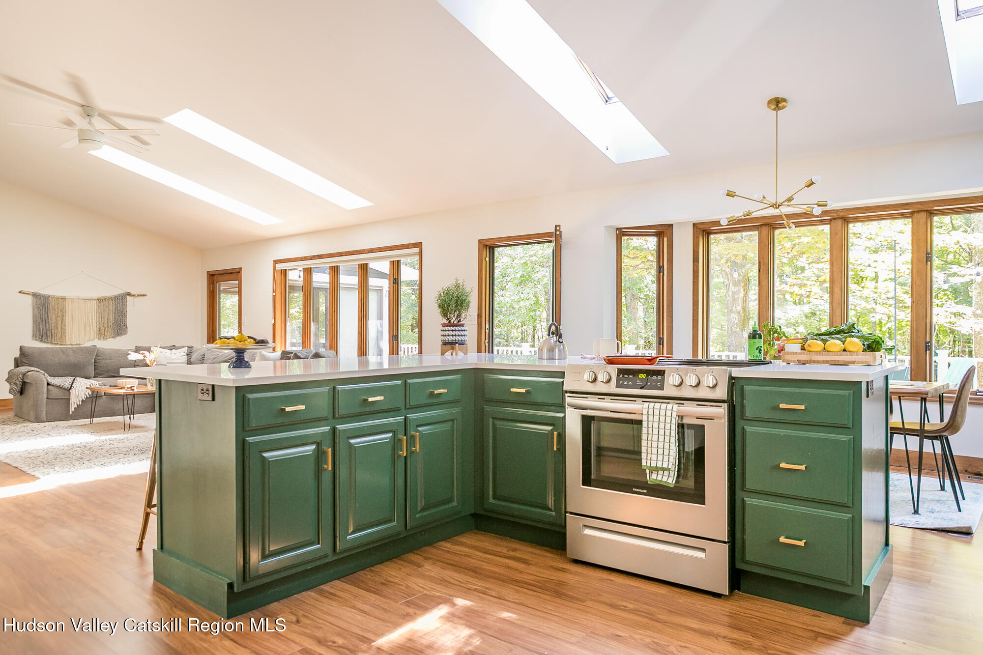 2 Romney Way Cottekill, NY 12419 - Photo 9 of 33 a kitchen with lots of counter top space sink and stainless steel appliances