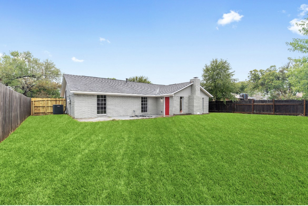 125 Bastrop Street Angleton, TX 77515 - Photo 18 of 18 a front view of house with yard and green space