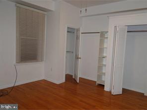 2349 South 11th Street, Unit 2 Philadelphia, PA 19148 - Photo 3 of 8 a view of empty room with wooden floor
