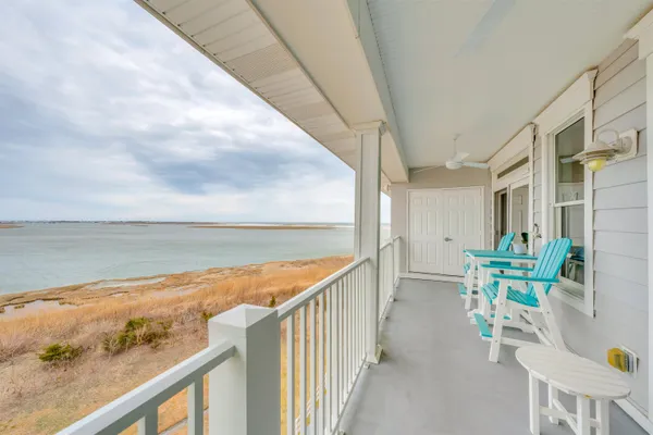 a balcony with an ocean view
