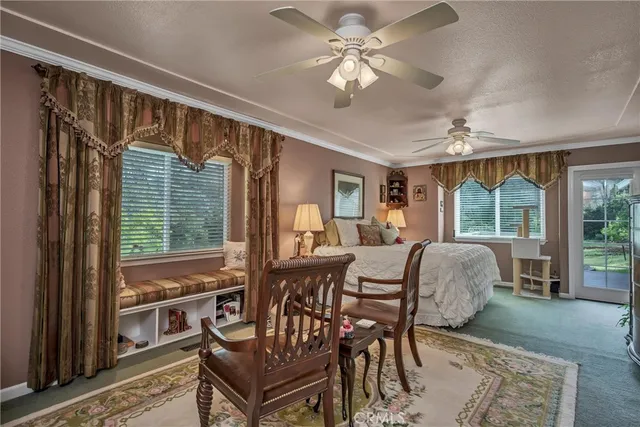 a spacious bathroom with a granite countertop sink toilet and shower