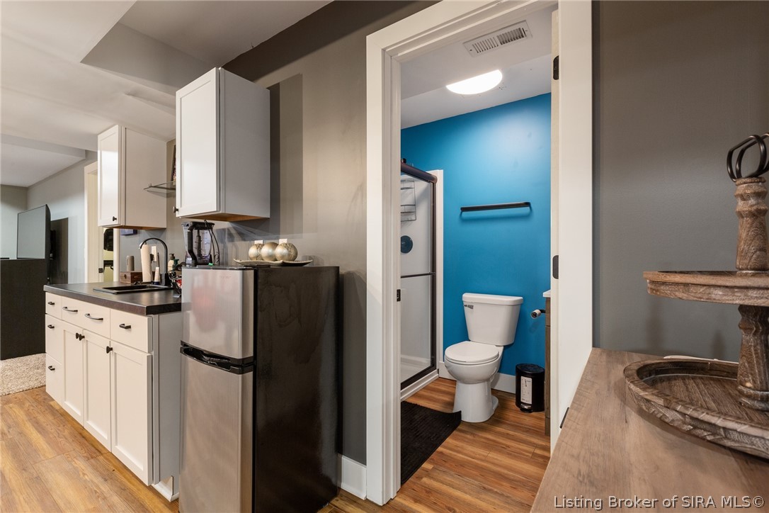 3102 Ambercrest Loop Jeffersonville, IN 47130 - Photo 37 of 53 Wet bar area in bsmt. Mini fridge does not stay.