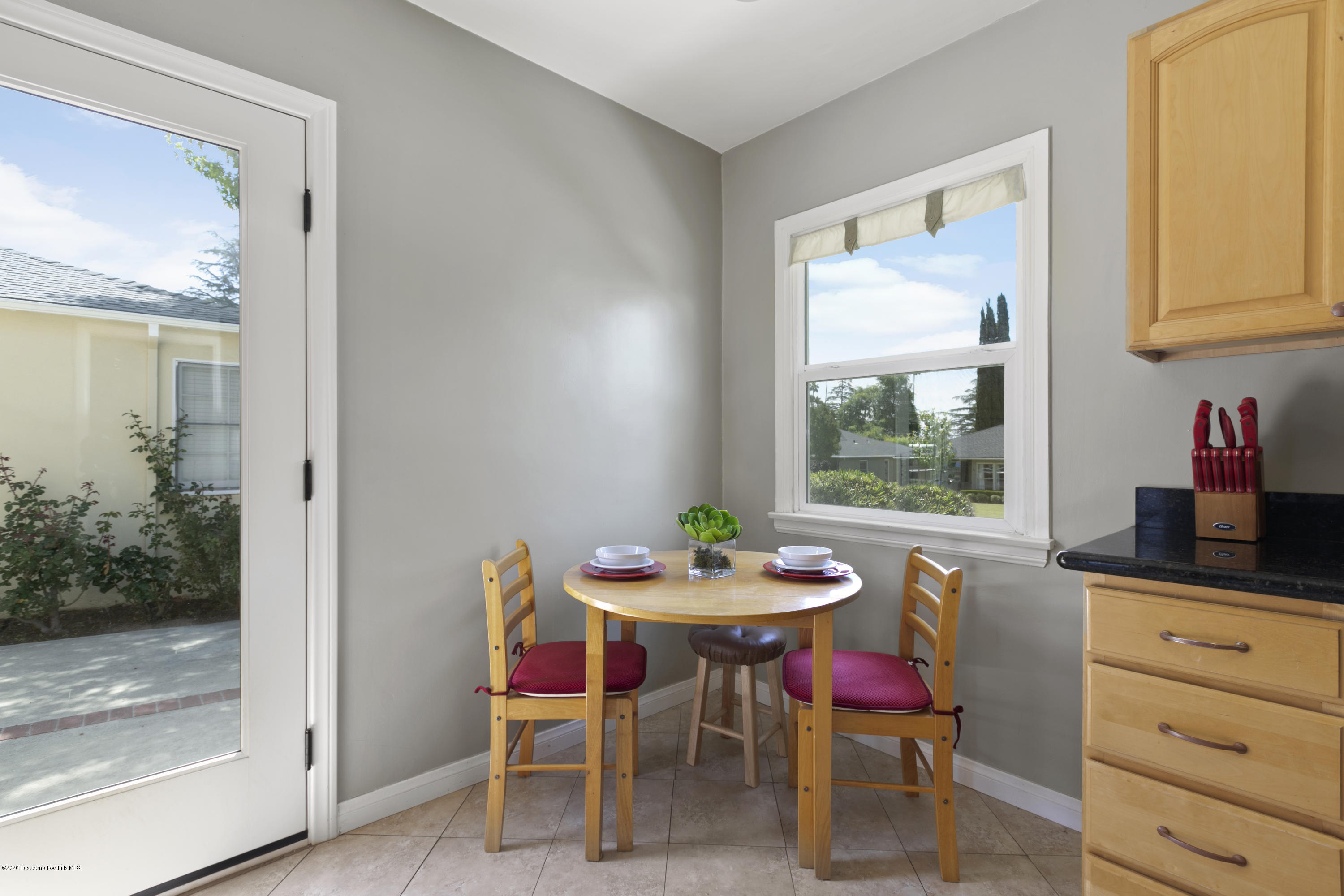 1231 Meadowbrook Road Altadena, CA 91001 - Photo 13 of 25 a view of a dining room with furniture and window
