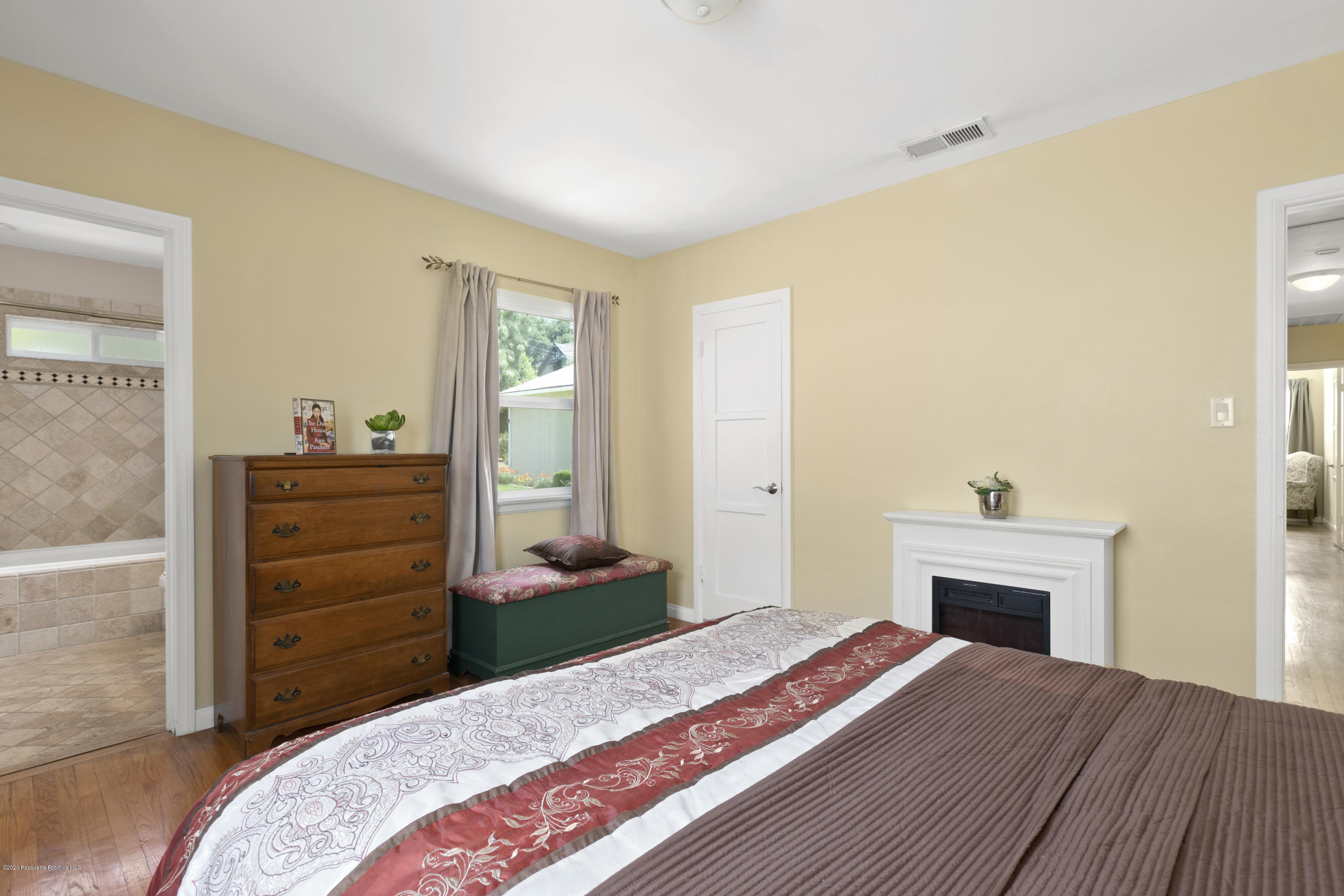1231 Meadowbrook Road Altadena, CA 91001 - Photo 16 of 25 a bedroom with a bed and a dresser