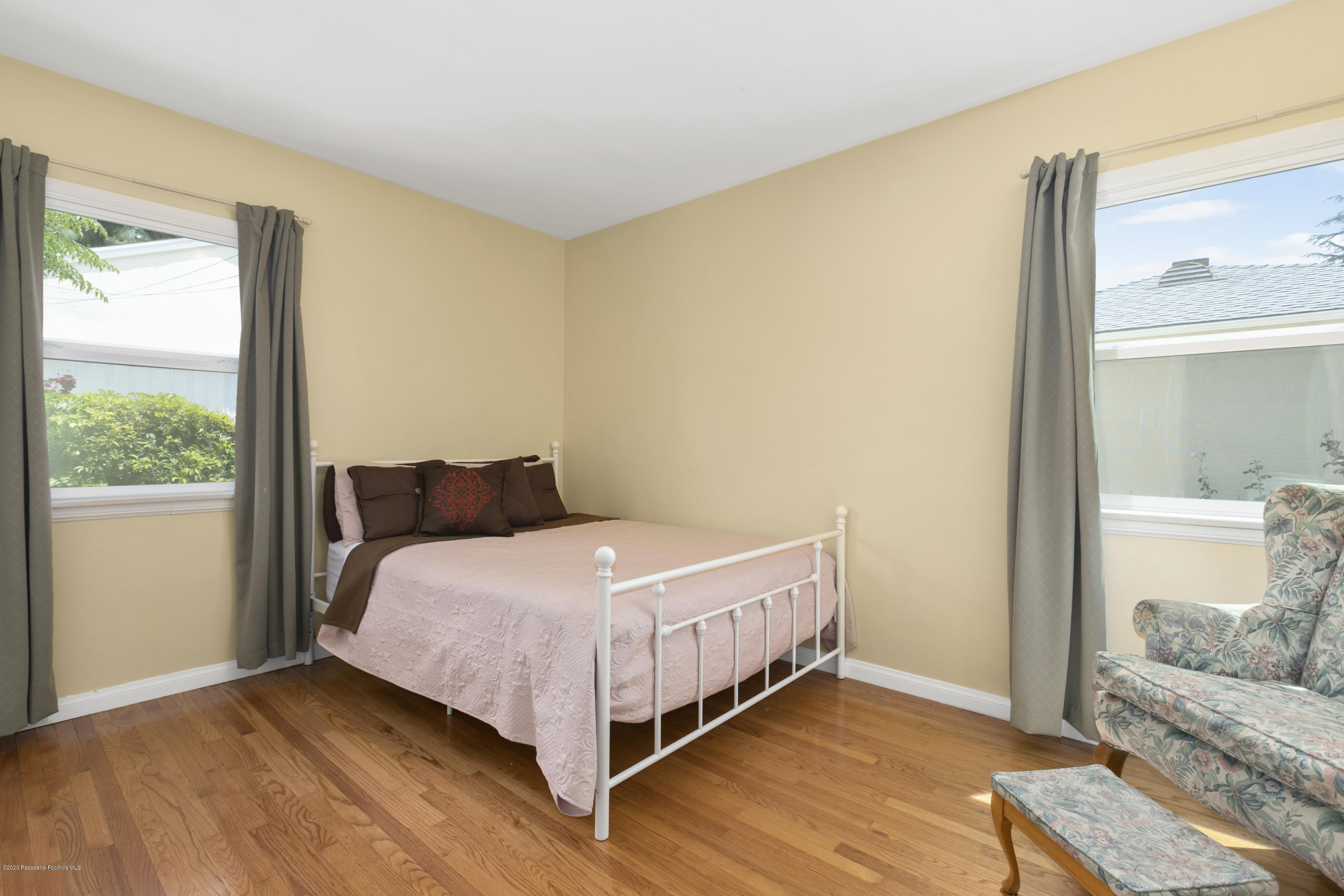 1231 Meadowbrook Road Altadena, CA 91001 - Photo 18 of 25 a bedroom with a bed and a window