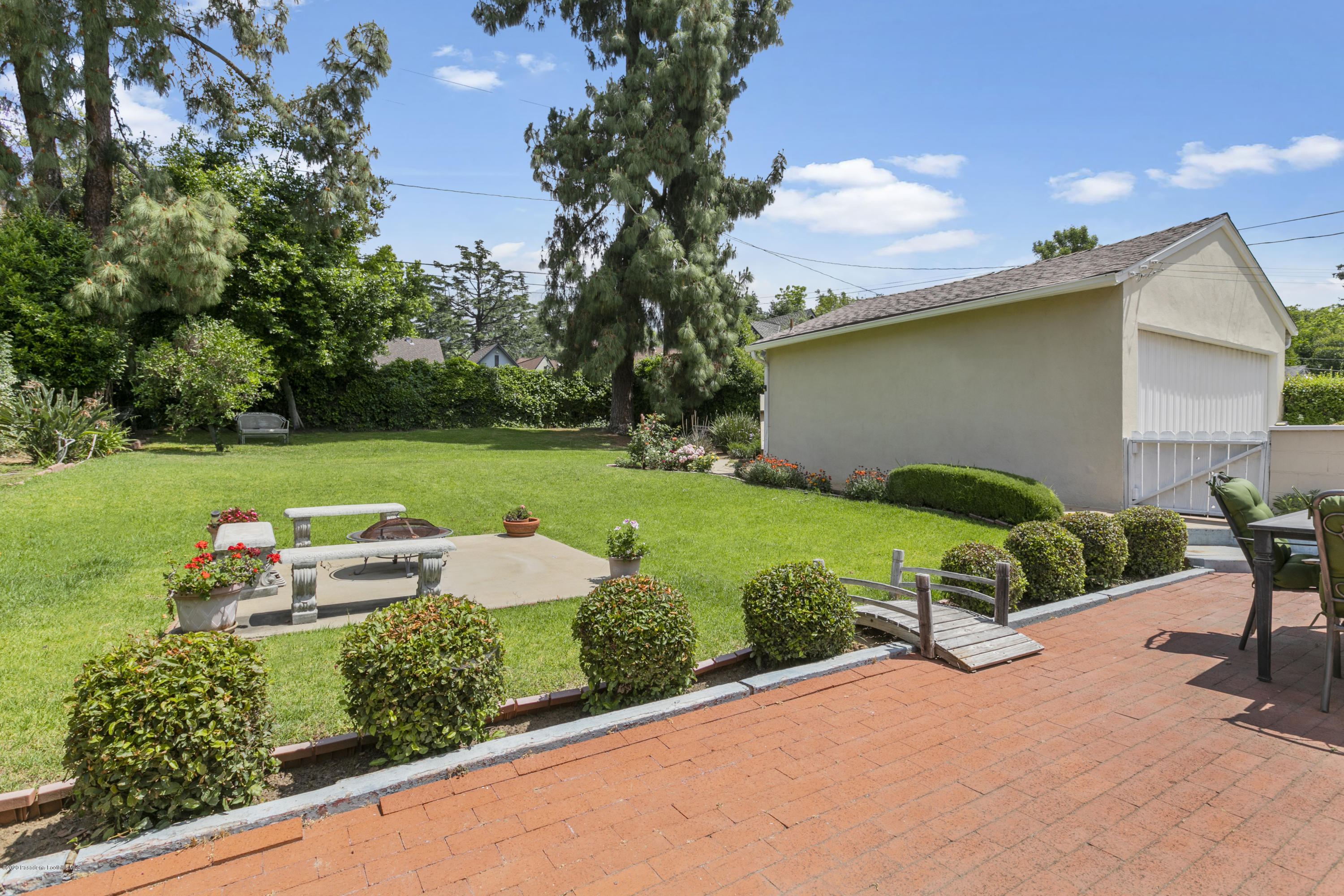 1231 Meadowbrook Road Altadena, CA 91001 - Photo 22 of 25 a view of a garden with a patio