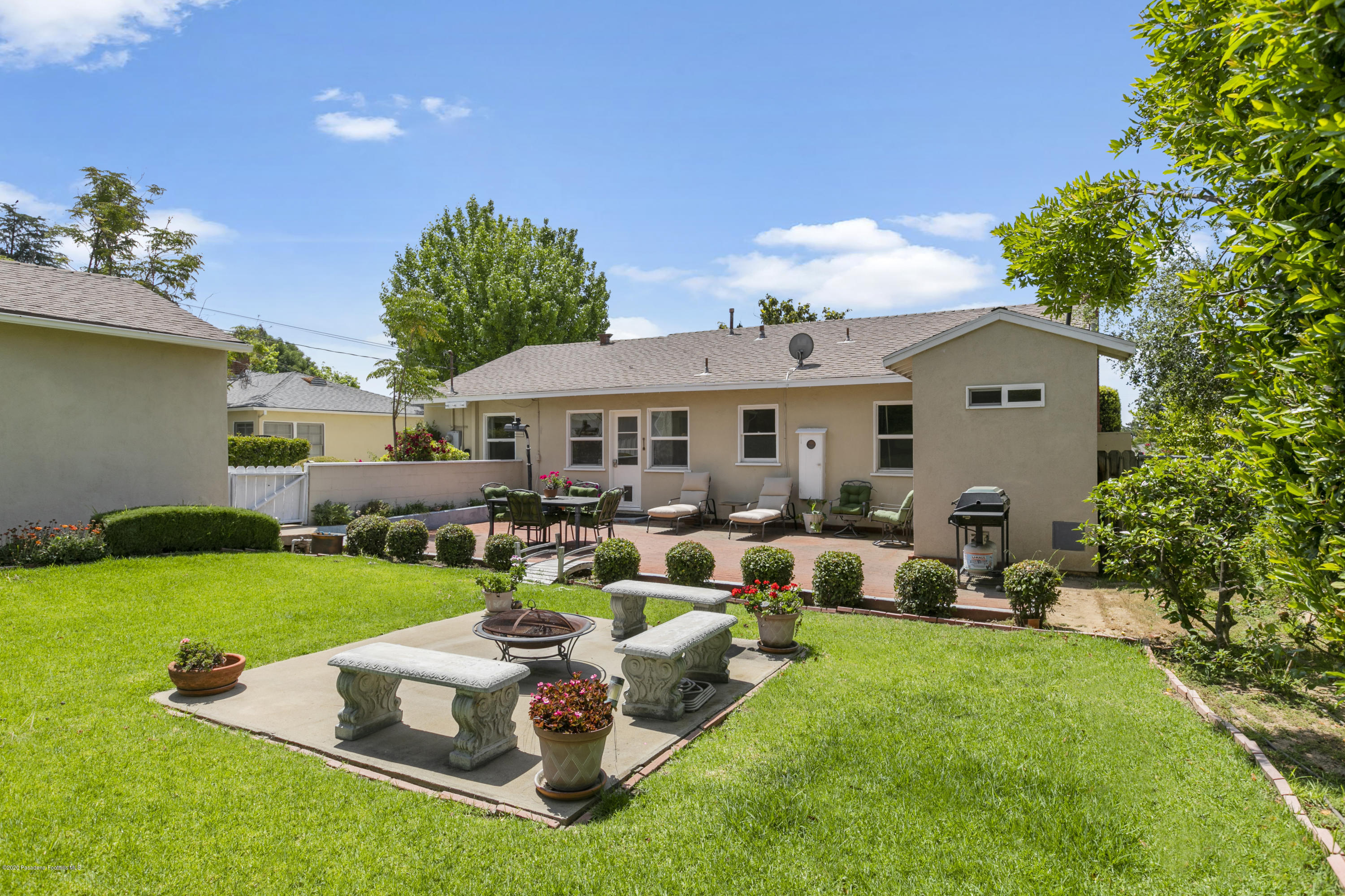 1231 Meadowbrook Road Altadena, CA 91001 - Photo 23 of 25 a front view of a house with garden and patio