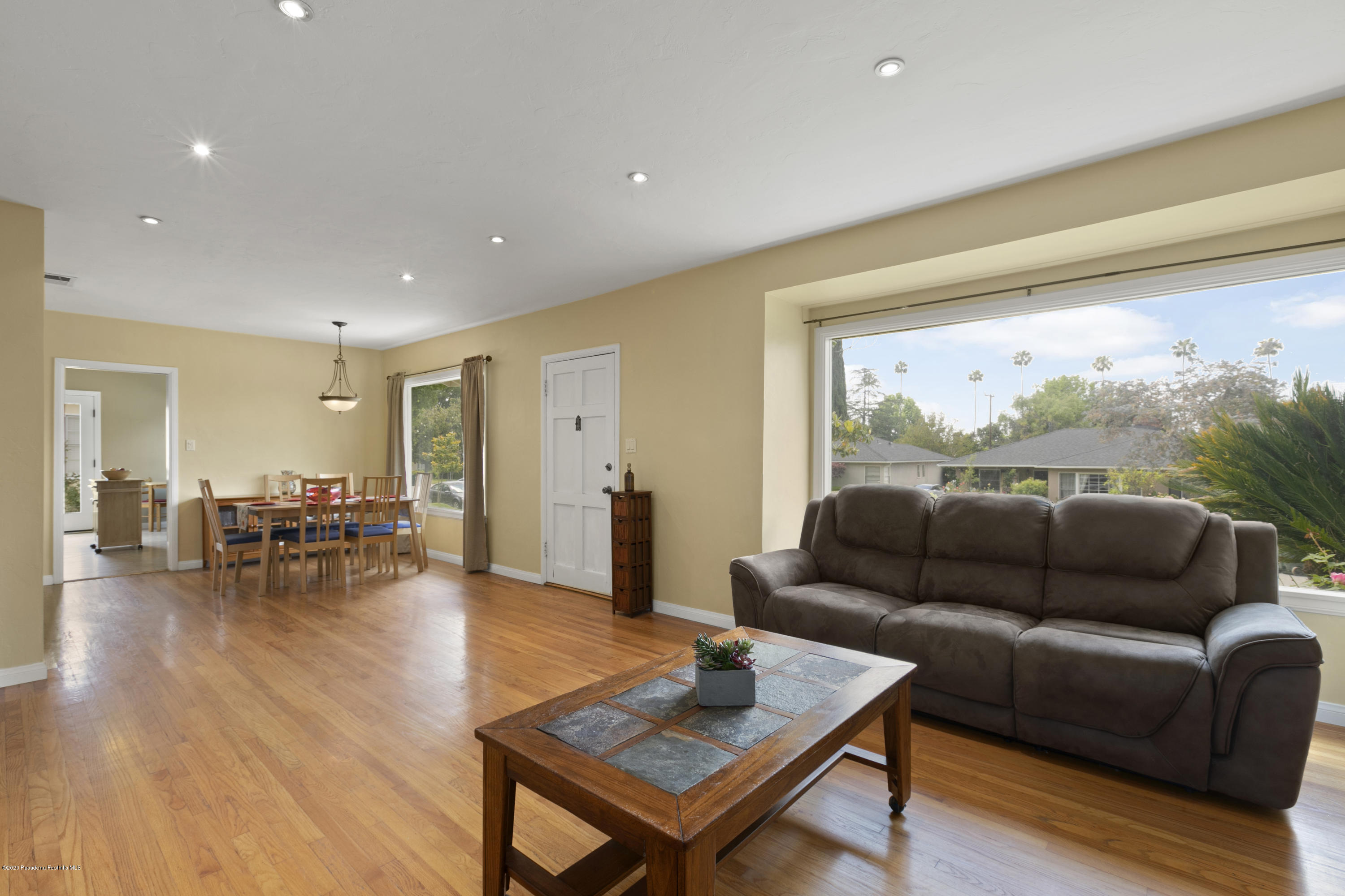 1231 Meadowbrook Road Altadena, CA 91001 - Photo 6 of 25 a living room with furniture and a table