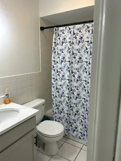 a bathroom with a toilet and a sink