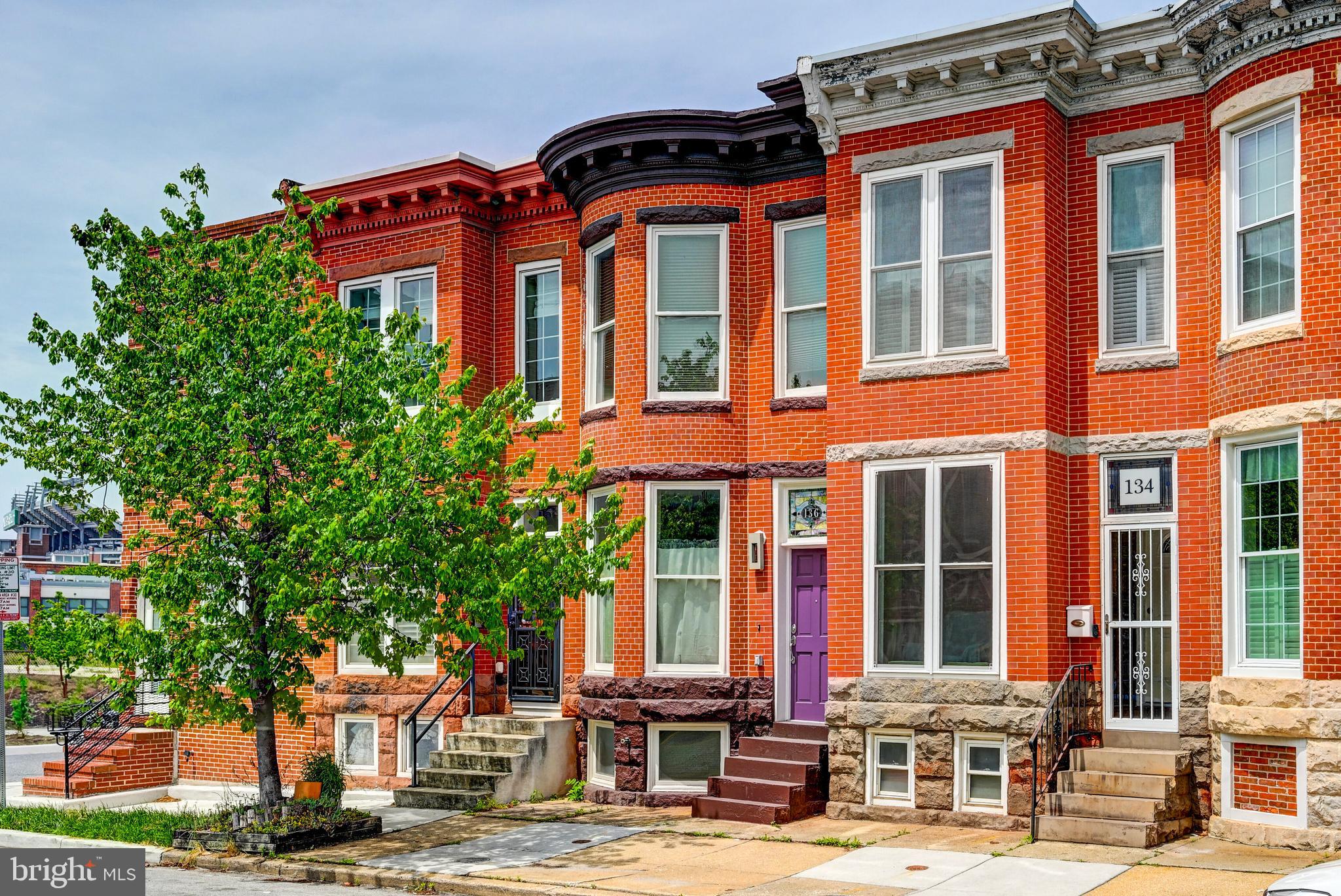 136 West Ostend Street Baltimore, MD 21230 - Photo 1 of 33 a front view of a building with street view