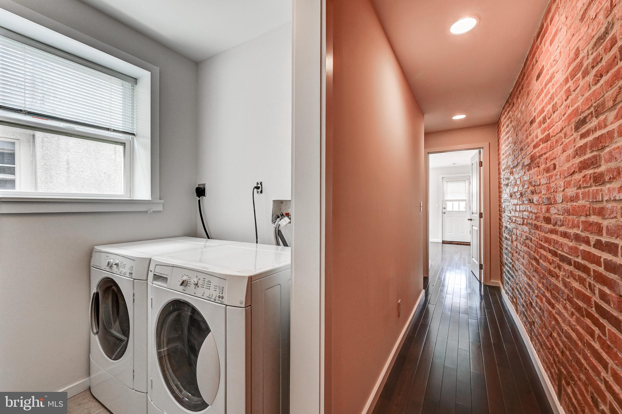 136 West Ostend Street Baltimore, MD 21230 - Photo 22 of 33 a view of a hallway with washer and dryer