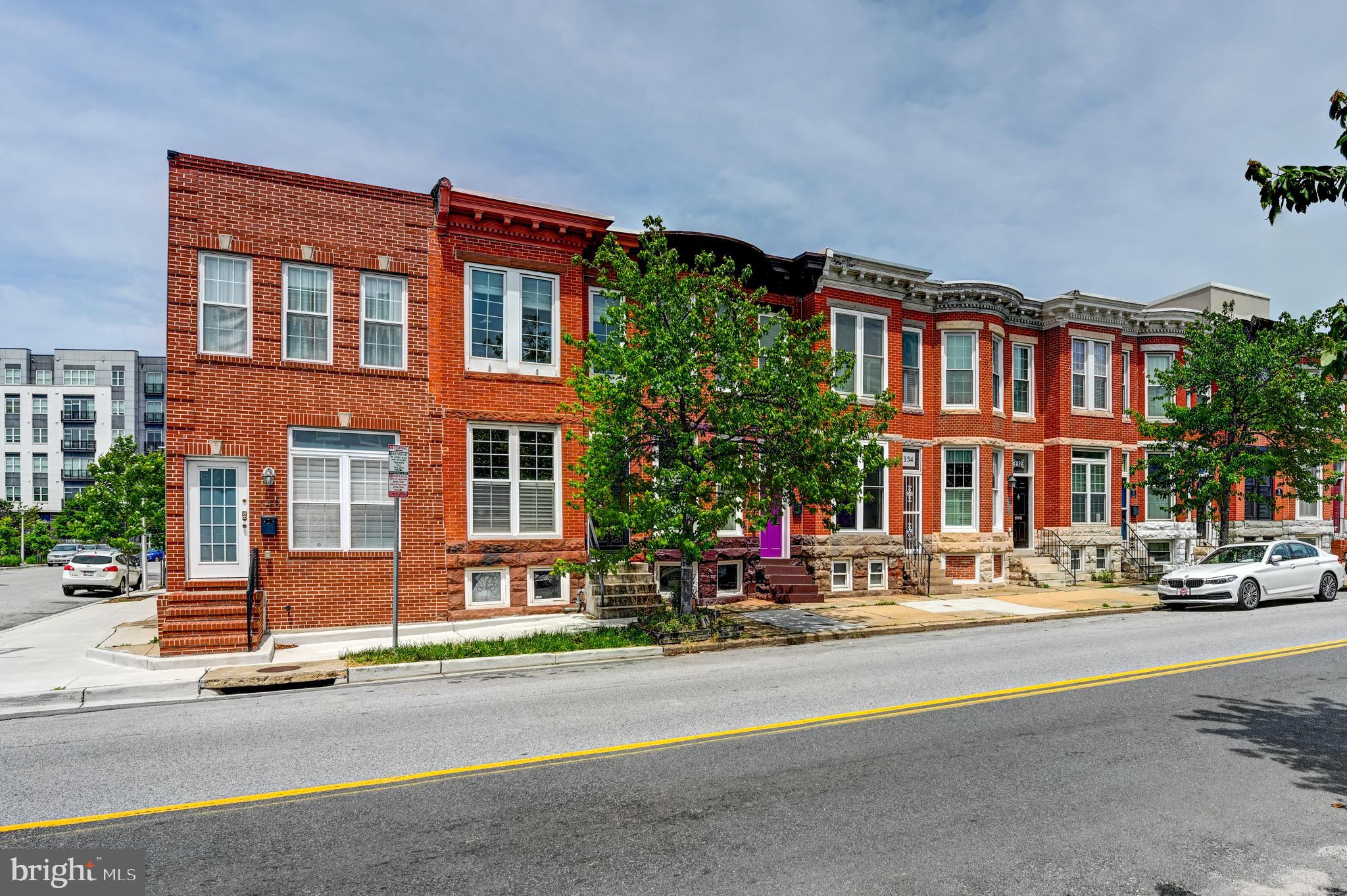 136 West Ostend Street Baltimore, MD 21230 - Photo 31 of 33 a front view of a building with street view