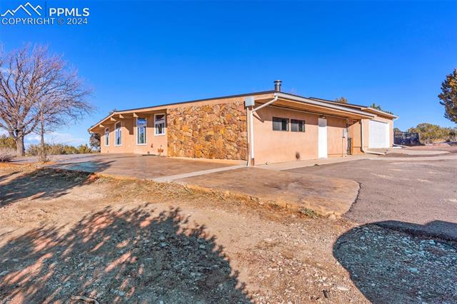 5835 Verde Road Pueblo, CO 81004 - Photo 3 of 50 Ranch-style home featuring a patio