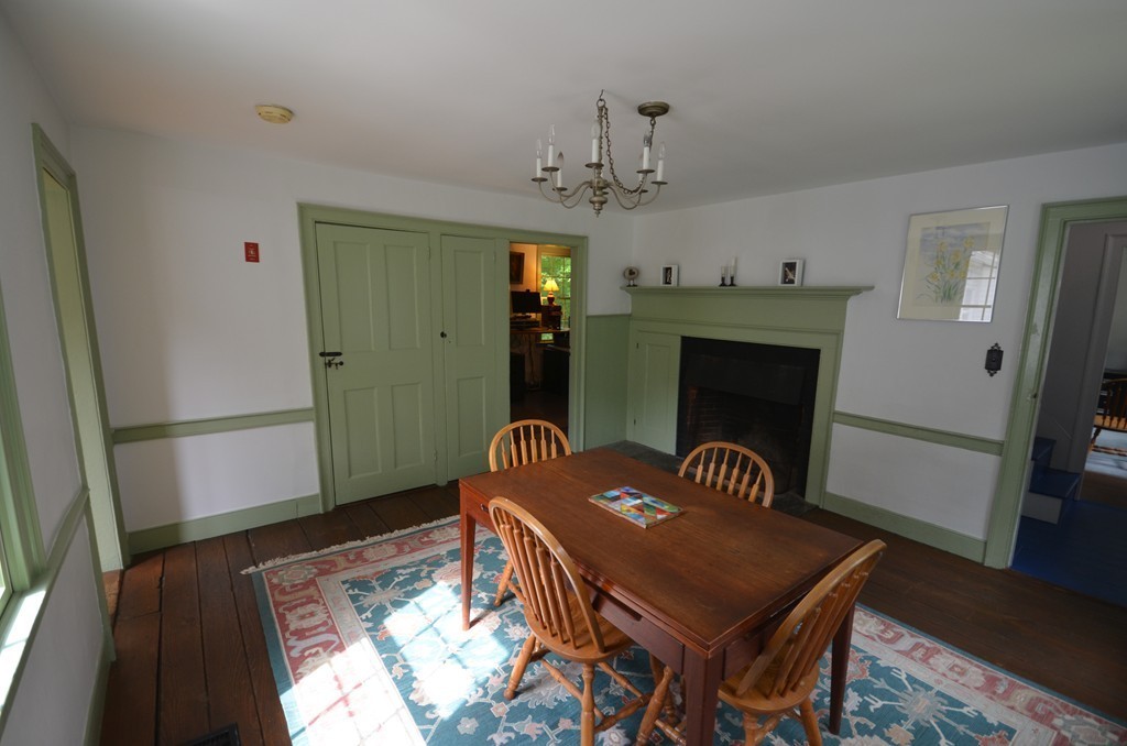 713 Bay Road Amherst, MA 01002 - Photo 14 of 29 a view of a livingroom with furniture and a window