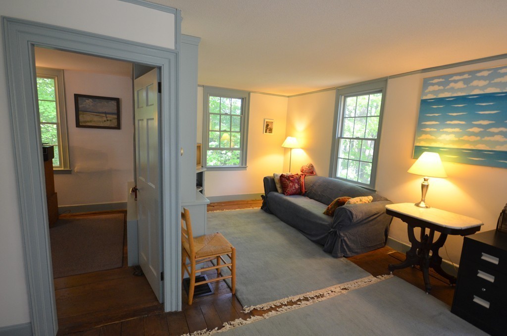 713 Bay Road Amherst, MA 01002 - Photo 17 of 29 a living room with furniture and a window