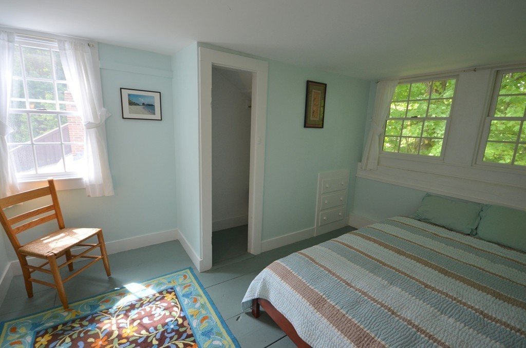 713 Bay Road Amherst, MA 01002 - Photo 23 of 29 a bedroom with a bed and chair