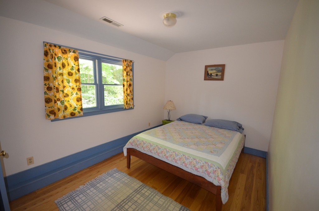 713 Bay Road Amherst, MA 01002 - Photo 24 of 29 a bedroom with a bed and a window