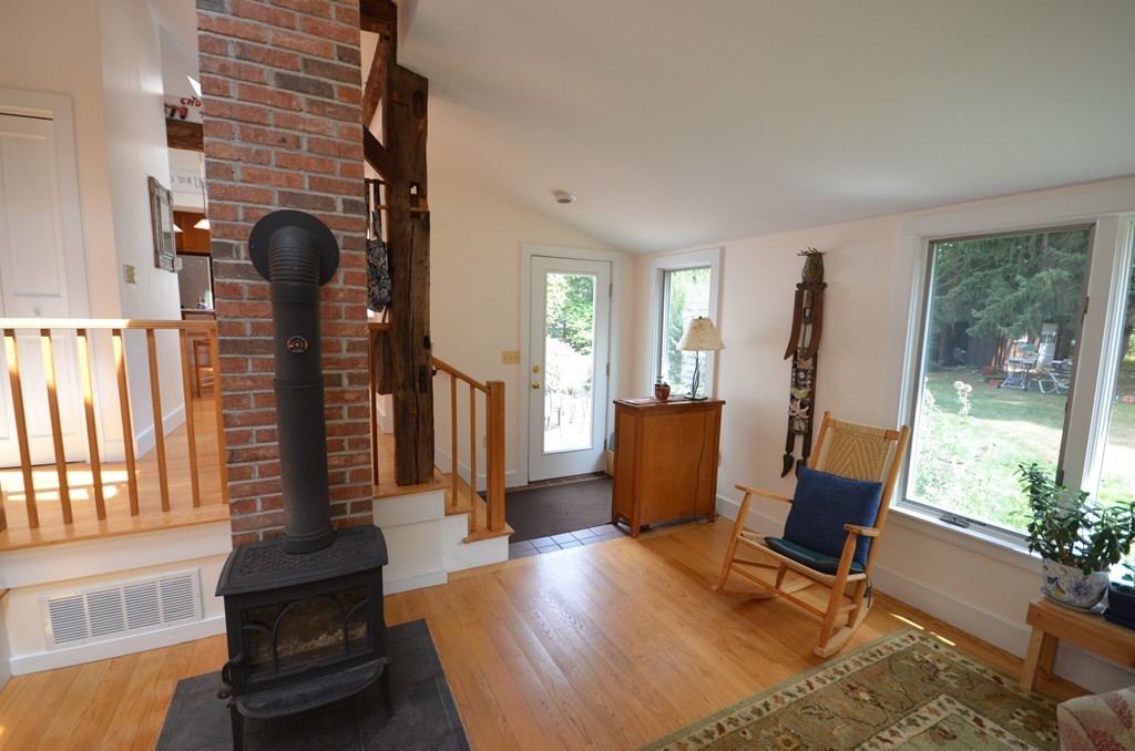 713 Bay Road Amherst, MA 01002 - Photo 6 of 29 a view of a livingroom with furniture and front door