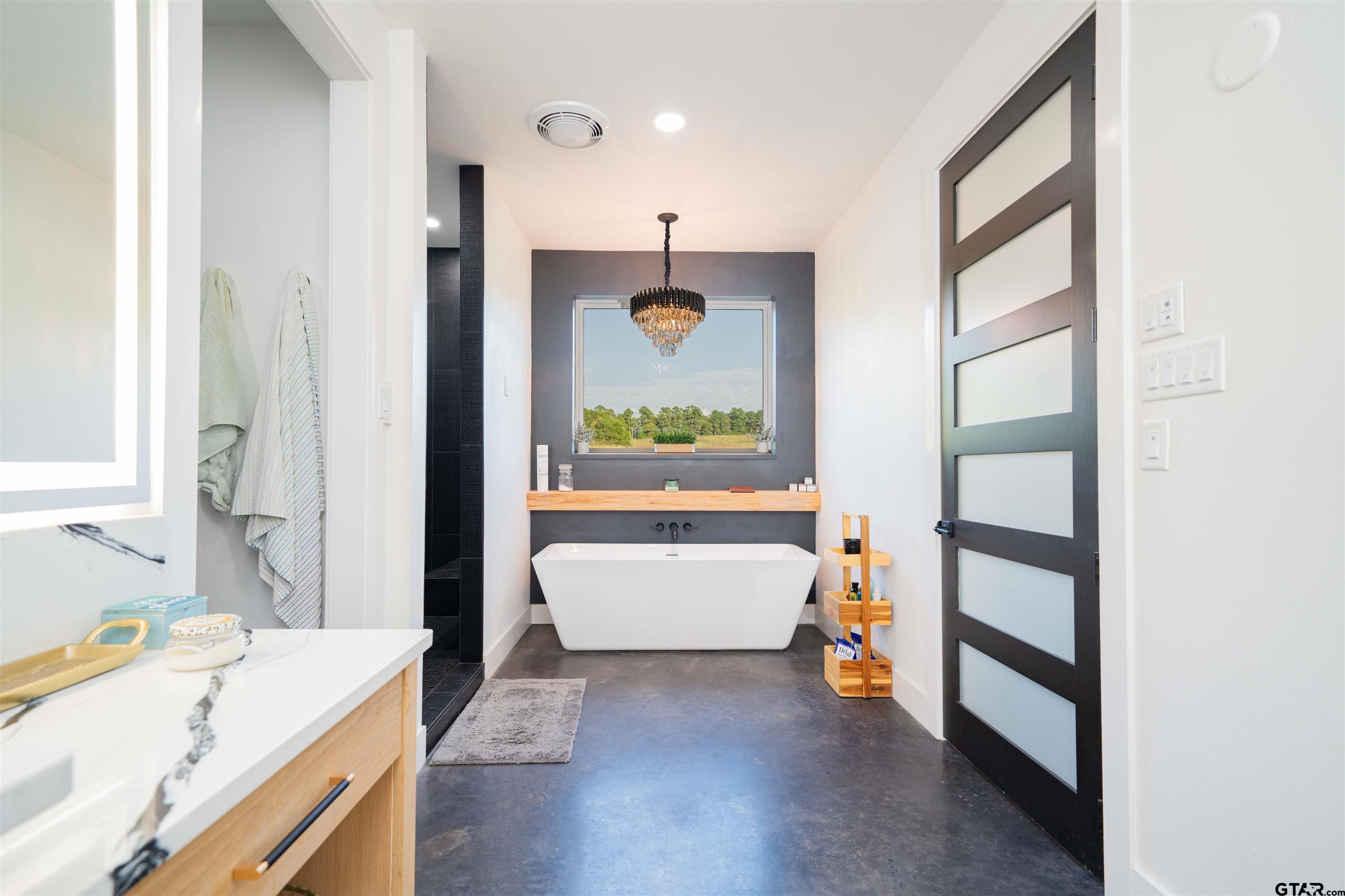 1258 Fire Tower Road Hallsville, TX 75650 - Photo 13 of 45 a view of an entryway with wooden floor and furniture