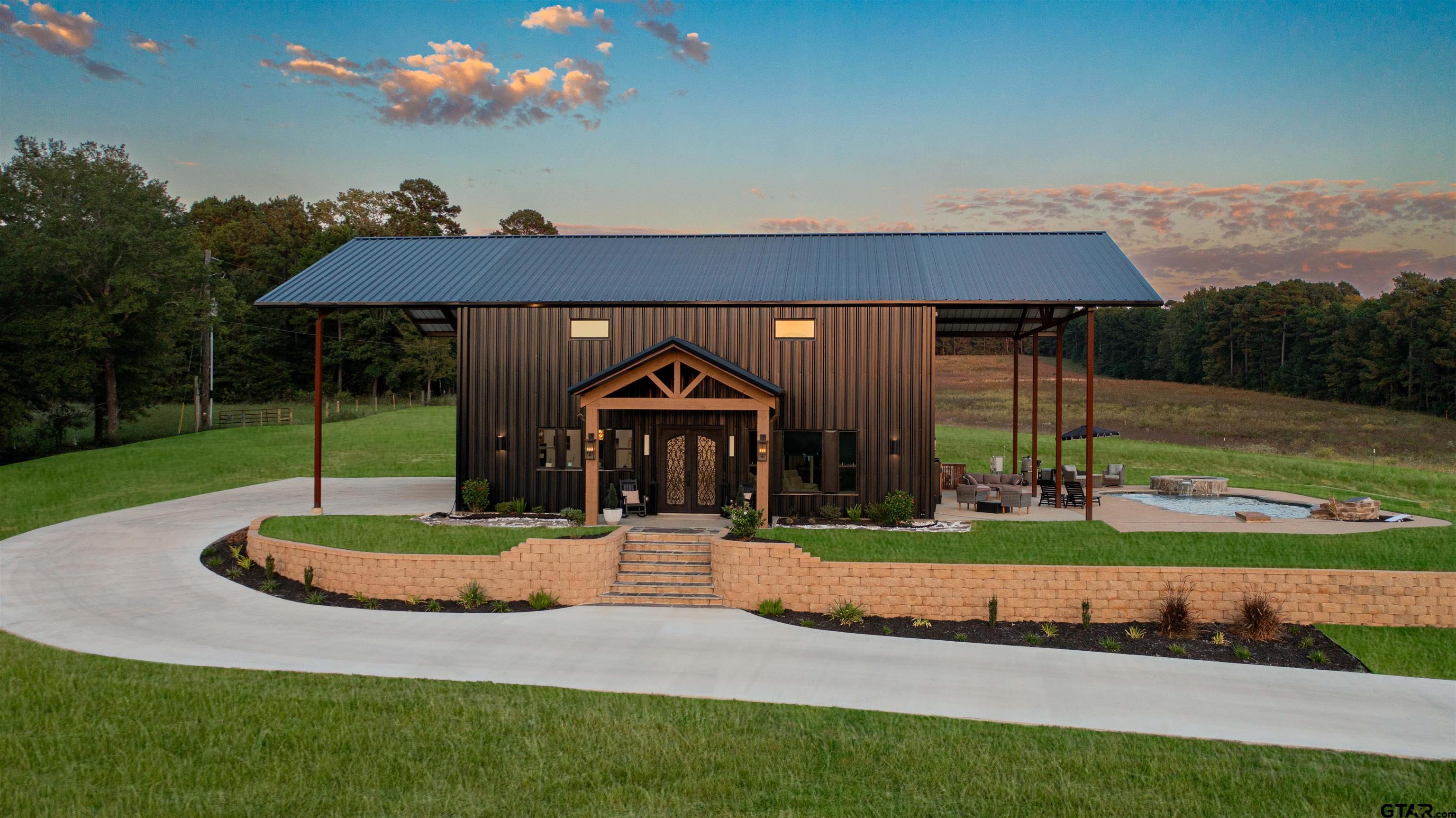 1258 Fire Tower Road Hallsville, TX 75650 - Photo 28 of 45 a front view of a house with a yard