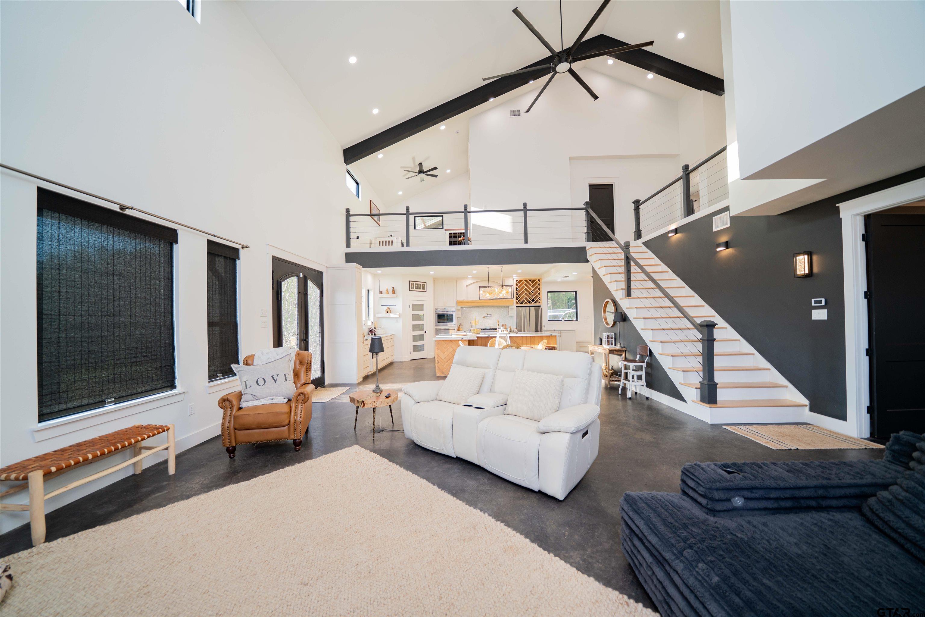 1258 Fire Tower Road Hallsville, TX 75650 - Photo 34 of 45 a living room with furniture and a flat screen tv