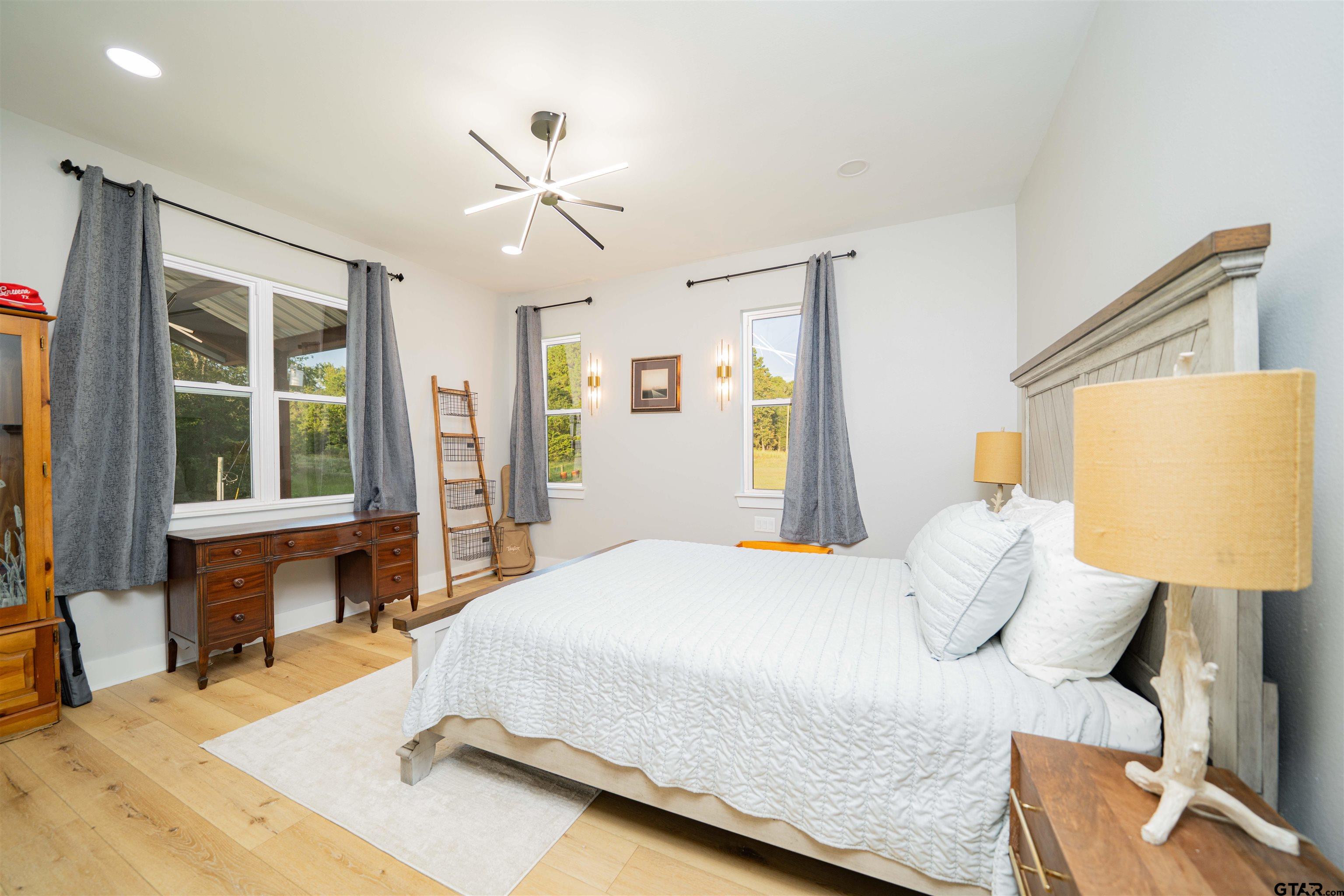 1258 Fire Tower Road Hallsville, TX 75650 - Photo 38 of 45 a bedroom with a bed and window