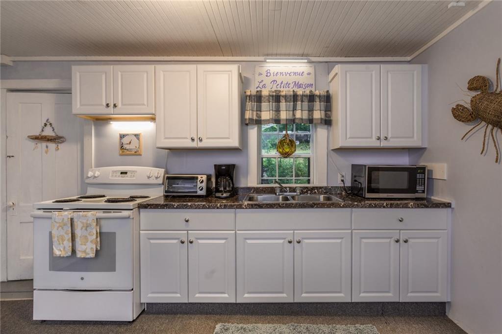 755 Shore Road Cape Neddick, ME 03902 - Photo 28 of 35 A close up of the adorable kitchen