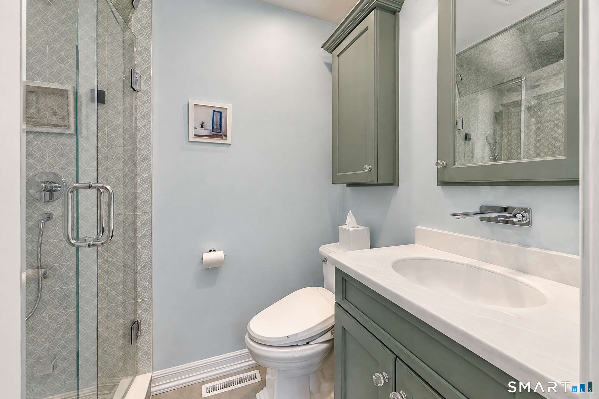 16 Winding Brook Road Newtown, CT 06470 - Photo 16 of 39 Beautifully updated full bath featuring a glass-enclosed tiled shower with steam, custom vanity and modern fixtures.